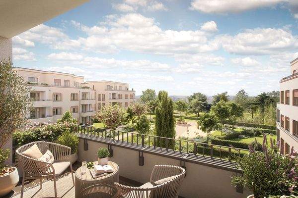 Balkon mit Ausblick in attraktive Grünanlagen