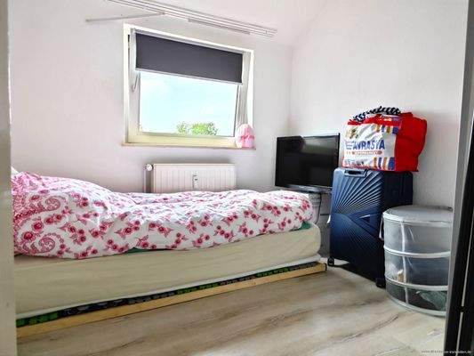 Schlafzimmer OG 2-Zimmer-Wohnung