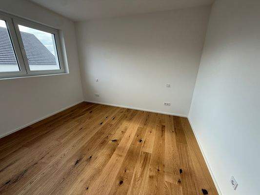 Schlafzimmer mit integriertem Ankleidebereich