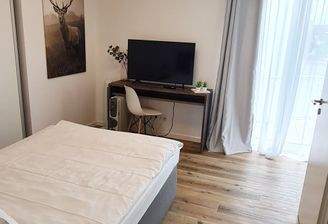 Wohnen + Schlafen Bild 1