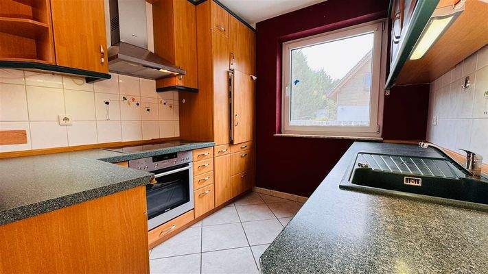 Wohnküche mit Einbauküche