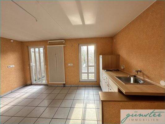 Anbau mit Küche und Zugang zum Garten