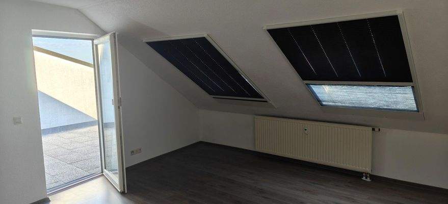 Wohnzimmer mit Ausgang Terasse