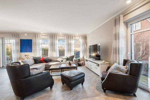 Wohnzimmer mit Zugang zur Terrasse