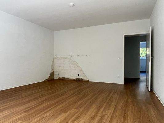 Wohnzimmer mit Parkettboden