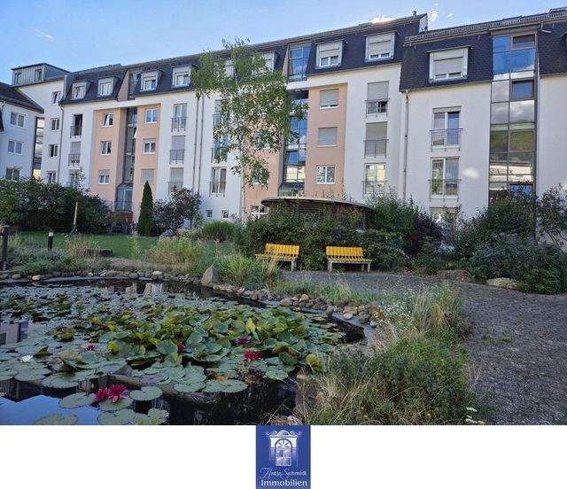 Eindrucksvolle Wohnung mit Balkon in gepflegter Umgebung! - Foto 4