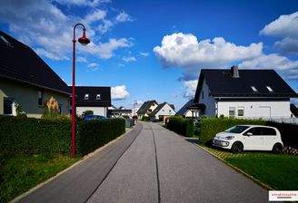 Blick vom Grundstück in die Siedlung