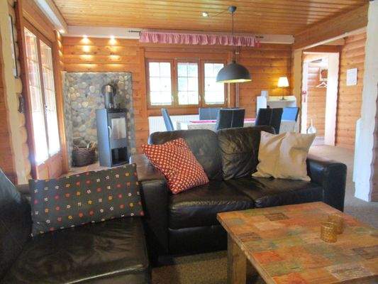 207. Wohnzimmer mit Kaminofen im EG.des Ferienhaus