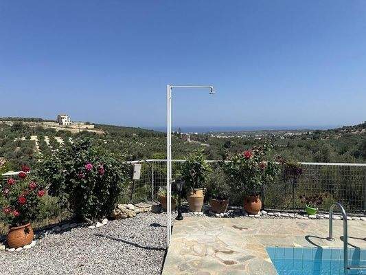 Kreta, Agia Triada: Charmantes Apartment mit Gemeinschaftspool und Meerblick zu verkaufen