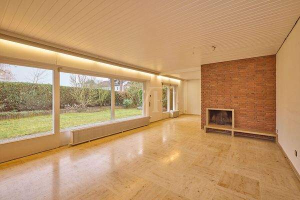 Repräsentativer Wohnbereich mit offenem Kamin