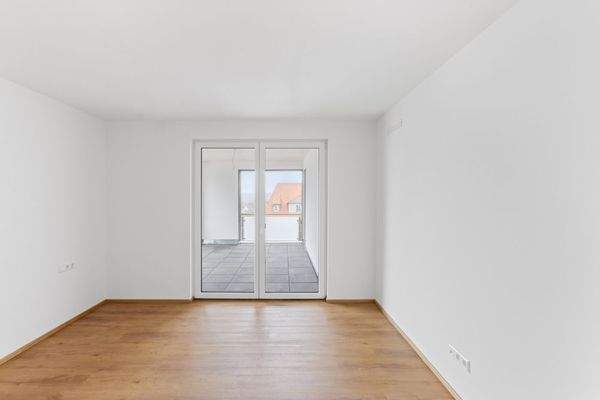 Schlafzimmer mit Zugang zur Terrasse