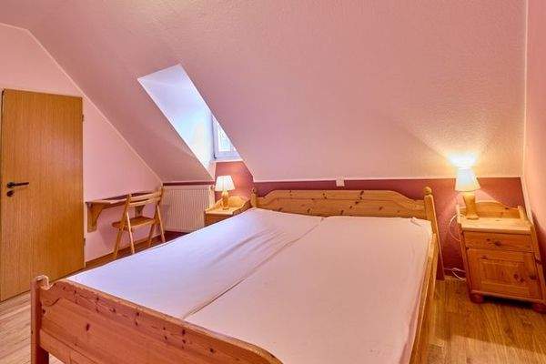 eines der Gästezimmer