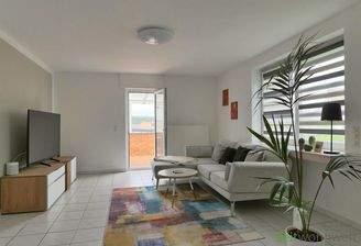 Blick zu TV und Terrasse