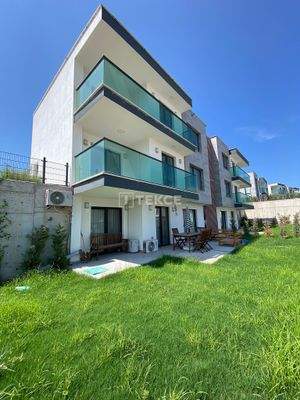 Sea View Penthouses in a Project with Pool in Bodrum