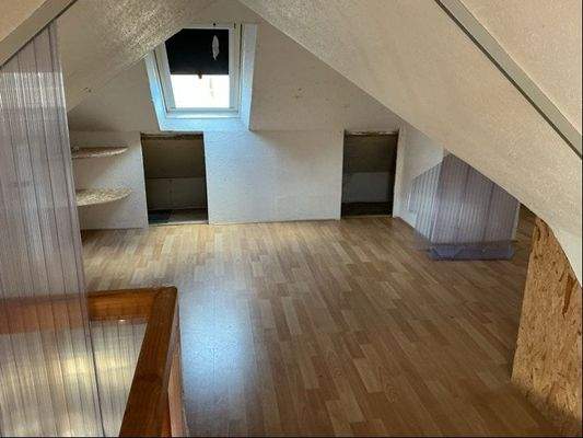 Schlafraum in Spitzboden