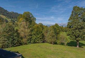 KITZIMMO-Baugrundstück mit Baugenehmigung in Aurach bei Kitzbühel.