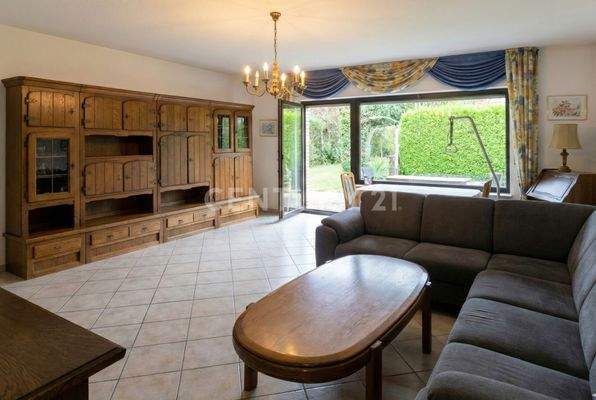 Wohnzimmer Bungalow mit Zugang zur Terasse