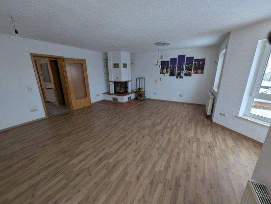 Wohnzimmer mit Kamin
