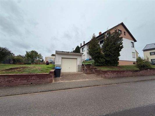 Garage /zusätzlich Grundstück für weitere Garage 