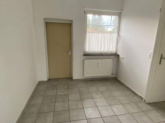 Küche mit Hinterausgang