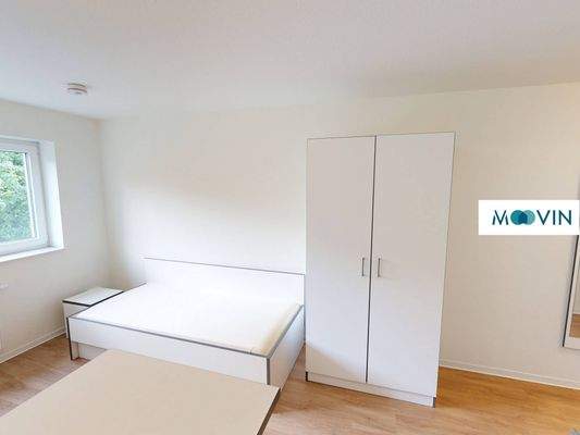 Ansicht IV: Wohn- und Schlafzimmer mit offenem Küchenbereich