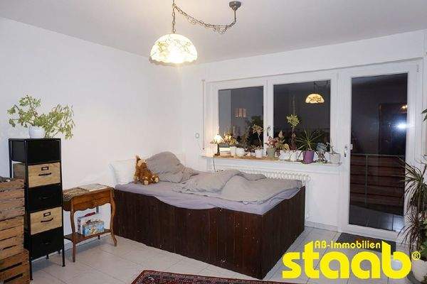 Schlafzimmer mit Balkonzugang