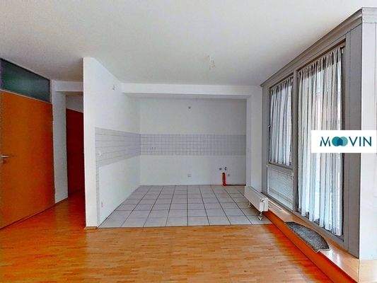 Ansicht IV: Wohn- und Esszimmer mit offenem Küchenbereich