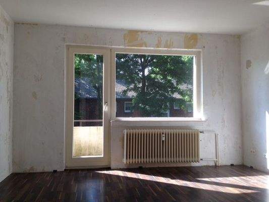 Wohnzimmer mit Balkon