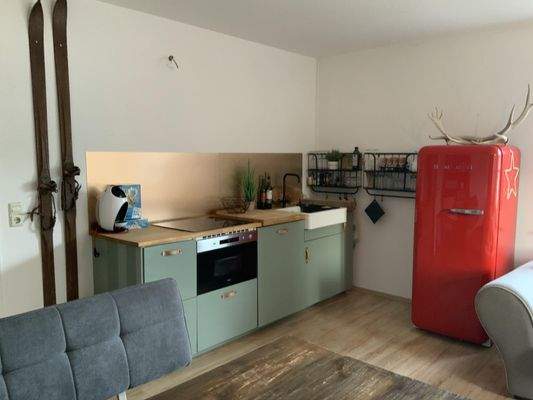 Wohnzimmer mit Küche