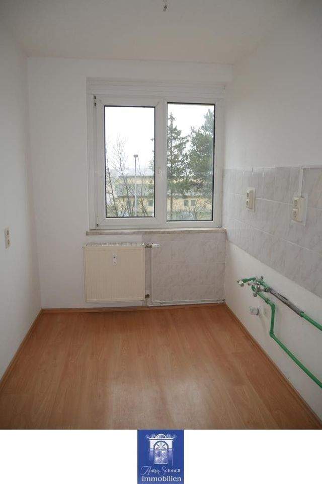 Heimische Wohnung mit Balkon in idyllischer Umgebung! - Foto 1