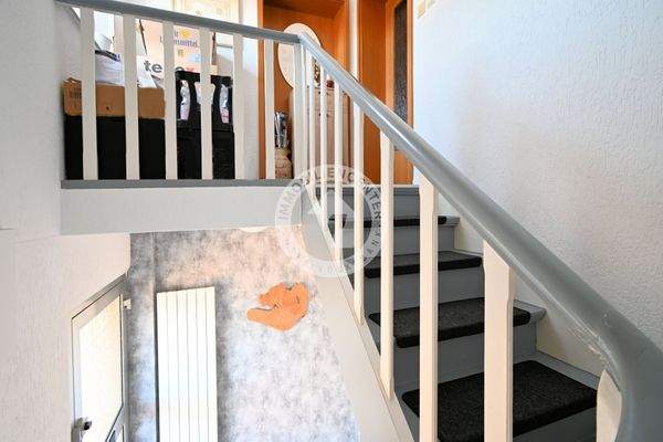 Der Treppenaufgang zum Dachgeschoss