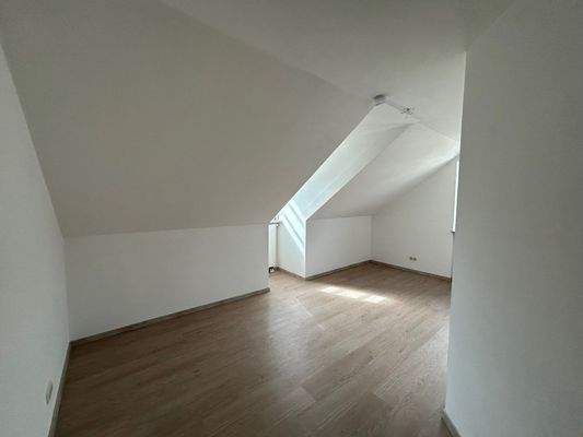 Zimmer in der Dachgeschosswohnung