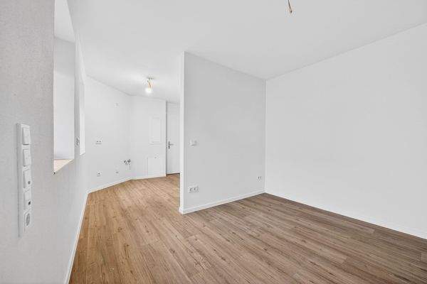 Blick in Richtung Schlafbereich und Küche