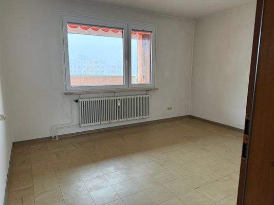 Schlafzimmer beim Balkon