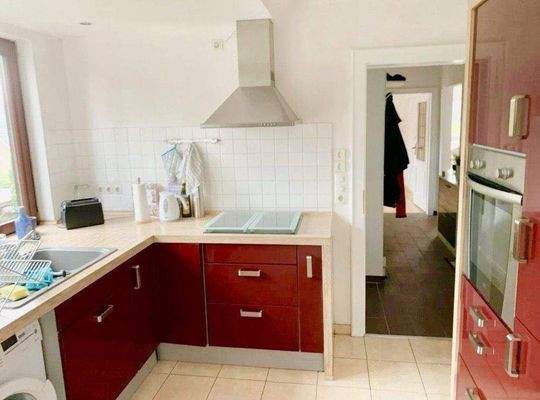 Küche Einliegerwohnung - Blick zum Flur