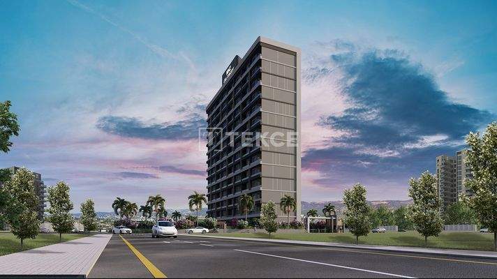 New Apartments in Mersin with a Pool and Modern Landscaping