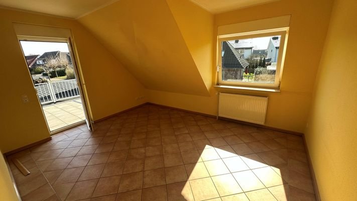 Zimmer mit Ausgang auf die Dachterrasse