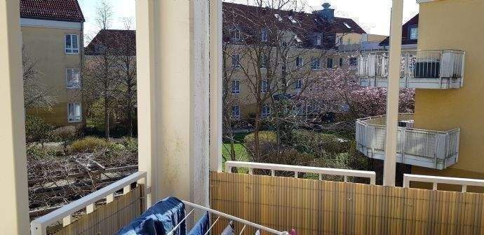Ausblick vom Balkon in den ruhigen Innenhof