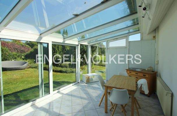 Beheizbarer Wintergarten mit Beschattungsmöglichkeit