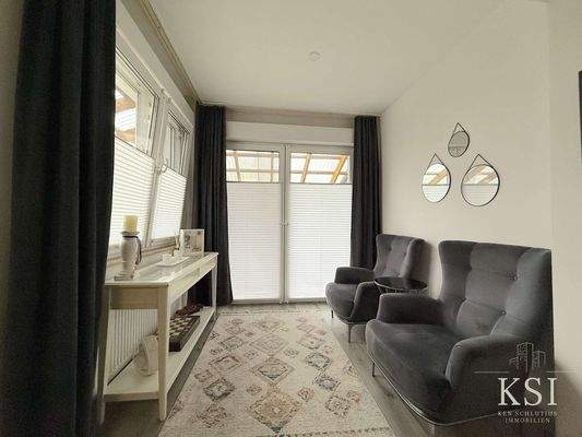 EG - Wohnzimmer mit Terrassen Zugang