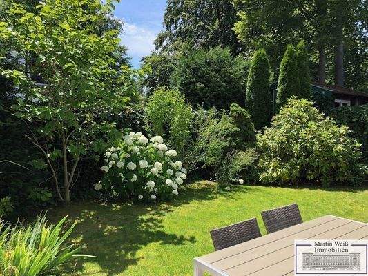 Süd-West-Terrasse mit Garten