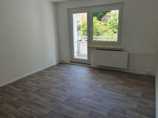 Wohnzimmer mit Balkon