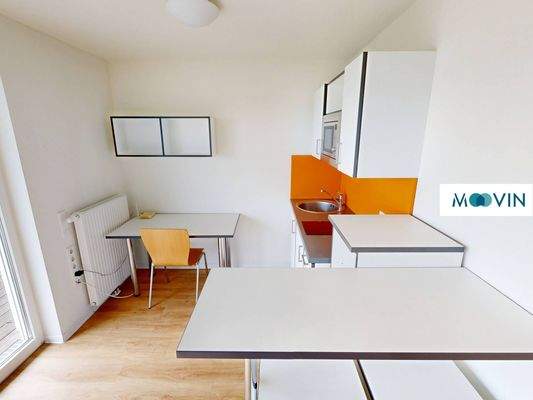 Ansicht IV: Wohn- und Schlafzimmer mit offenem Küchenbereich