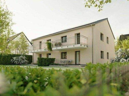 4-Familienhaus Gartenansicht.jpg