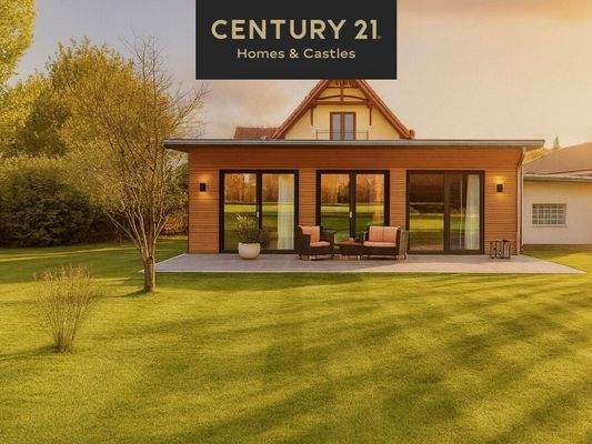 Traumhafte Gartenansicht der Rückseite – moderne Fassade mit