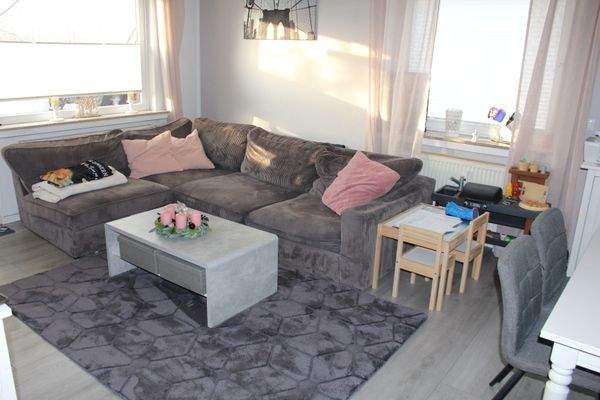 Wohnzimmer mit Balkon