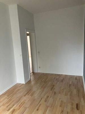 Wohnzimmer mit Holzboden