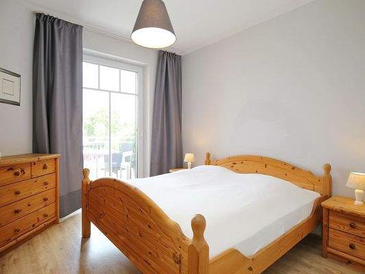 Schlafzimmer mit Balkonzugang