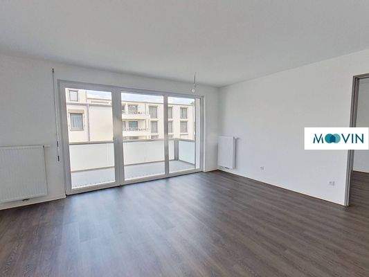 Ansicht III: Wohn- und Esszimmer mit offenem Küchenbereich