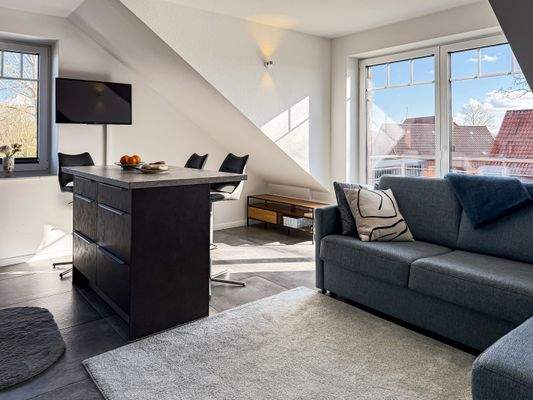 Wohnzimmer mit Balkonzugang